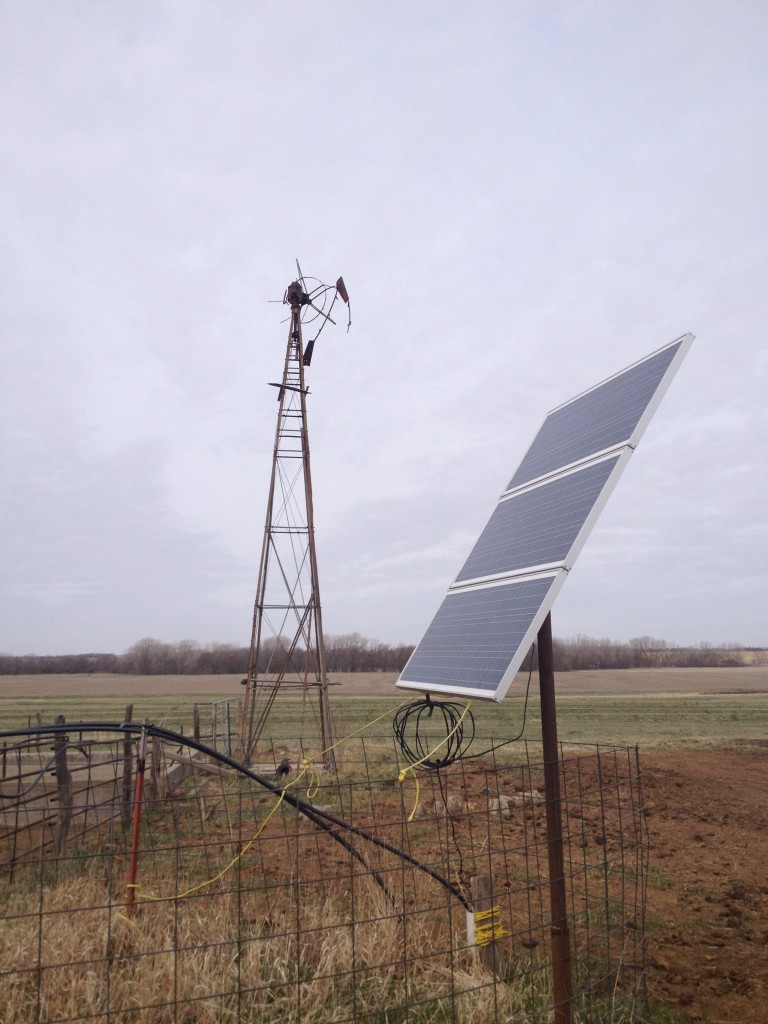Here's the solar panel, for the pump on a well. You can see the old windmill.